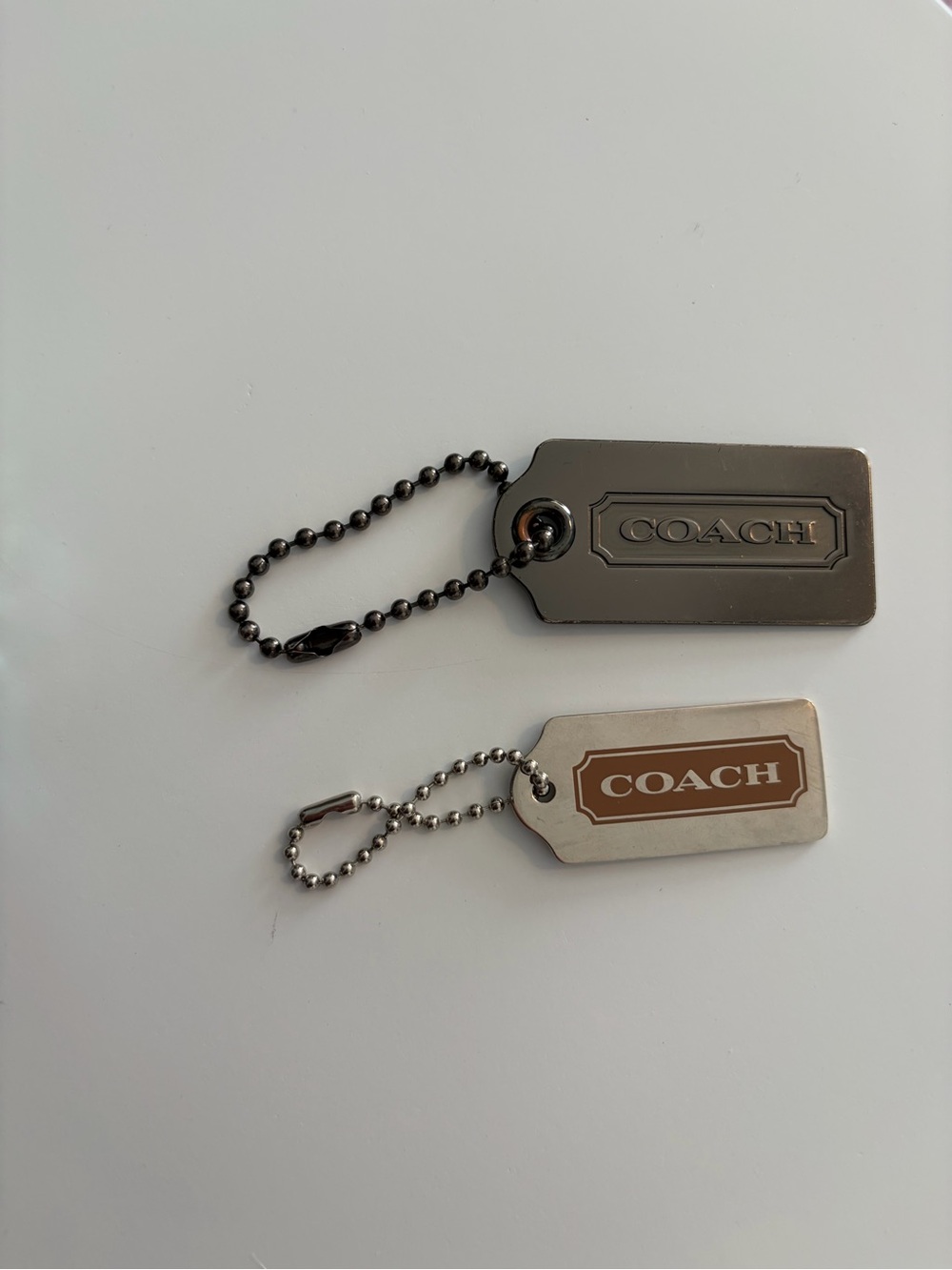 Coach gunmetal and metal hang tags